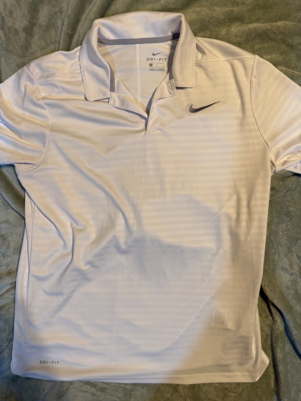 Nike Men’s White Dri-FIT Polo with Black Swoosh